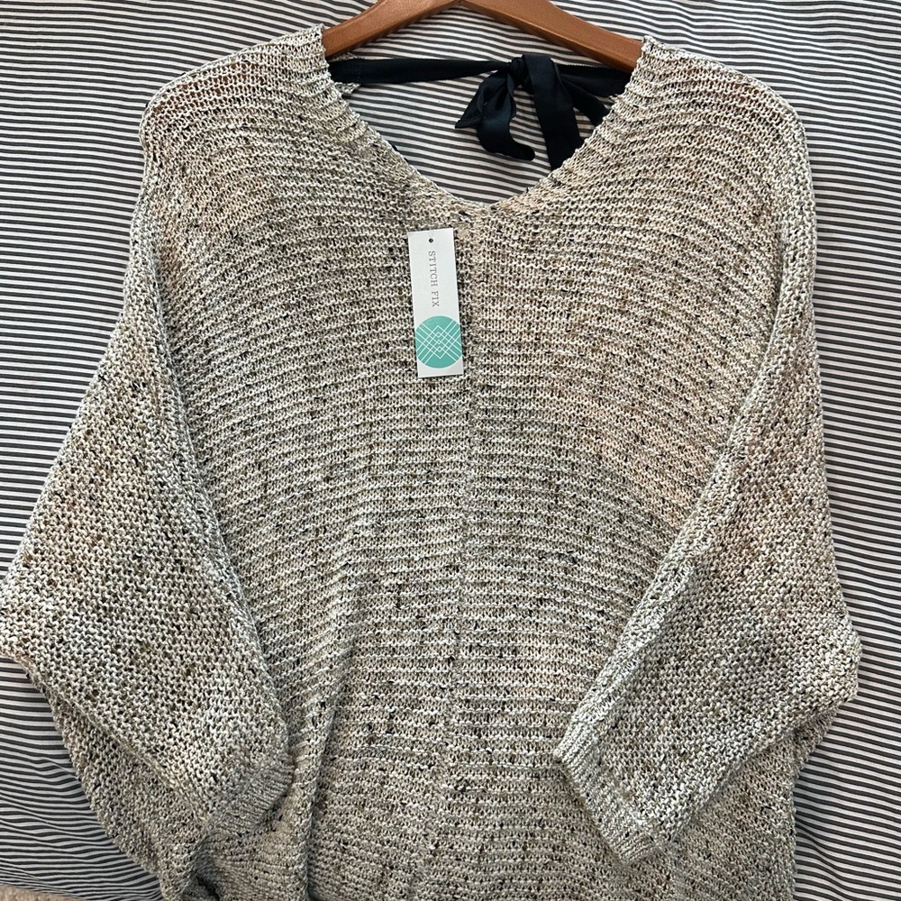 Brand New!! Still has tags! Perfect for a night out with jeans or a skirt!